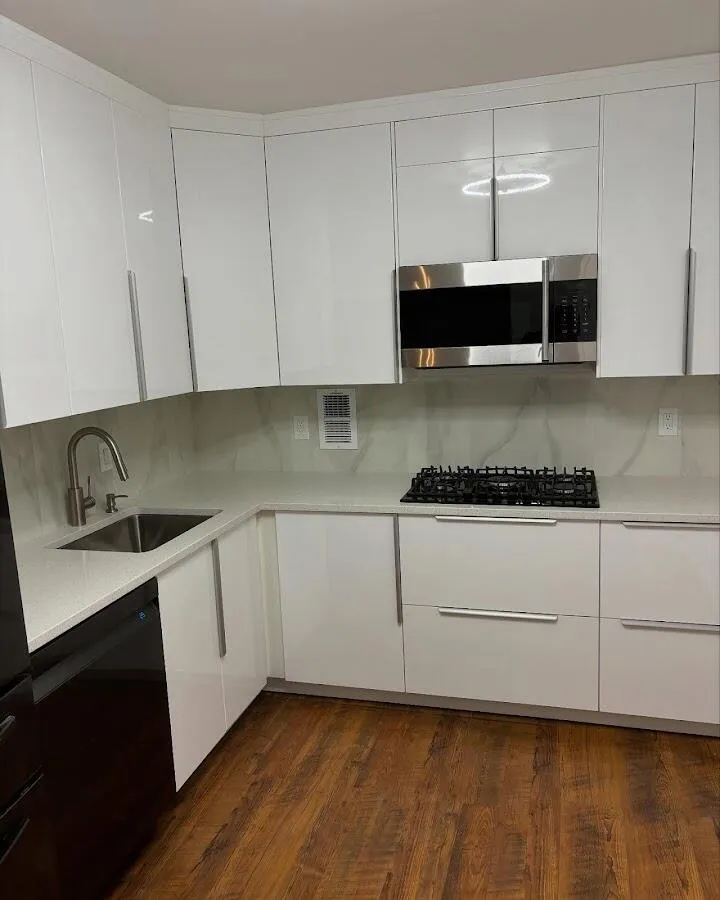 Restored kitchen with white cabinets after water damage in Miami Shores